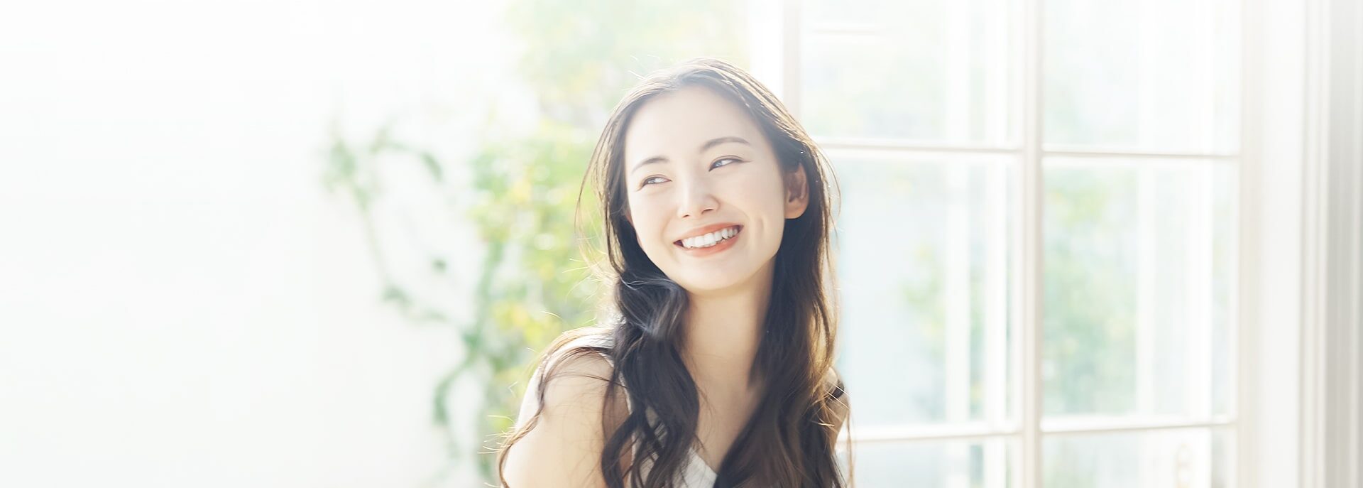 Young woman enjoying clear vision in North York after Ortho-K treatment.