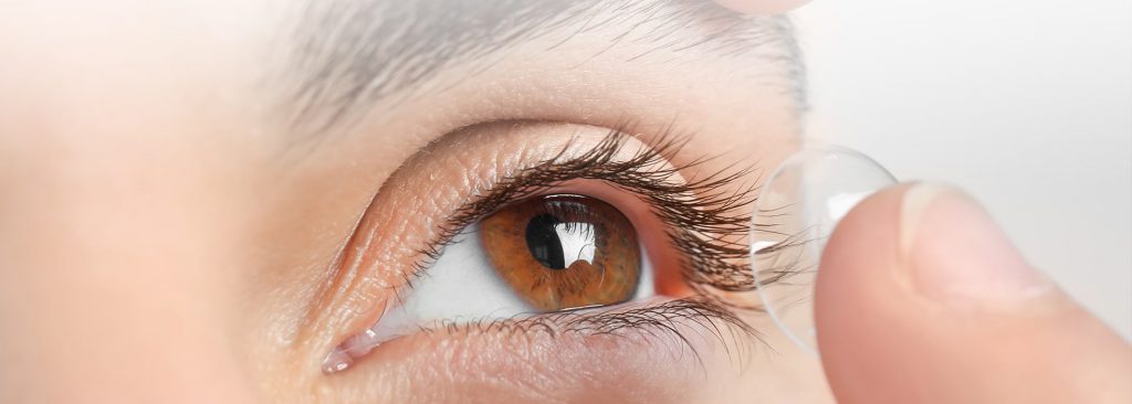 ortho k lenses being put in eye